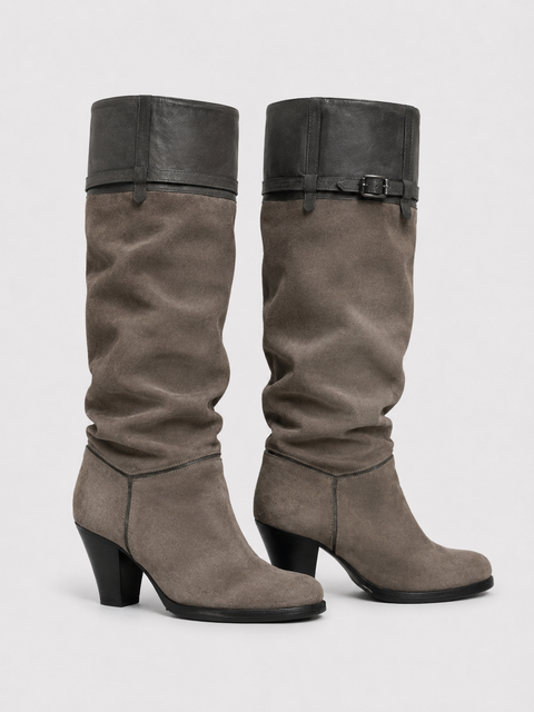 Vista de lado de botas altas de ante Barbara Bui