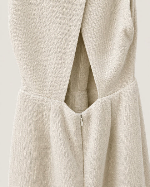 Vista trasera del vestido IRO PARIS blanco con espalda abierta, talla 34