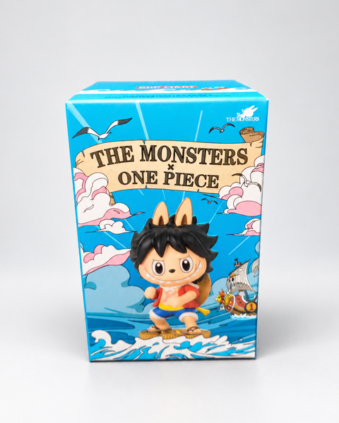 Caja azul de POP MART THE MONSTERS × ONE PIECE con ilustración de Luffy.