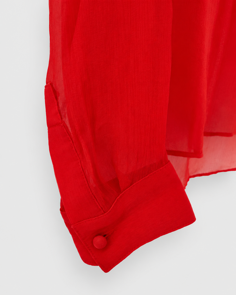 Manga larga y puño abotonado de la blusa roja THE KOOPLES