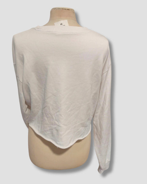 Vista trasera de la sudadera cropped Cheap Monday blanca.